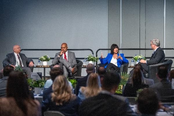 Grand Valley President Philomena V. Mantella answers a question from Crain's Executive Editor Mickey Ciokajlo during a panel discussion with Ferris State President Bill Pink and Grand Rapids Community College President Charles Pepper